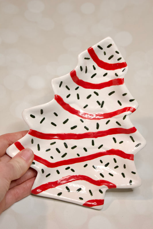 Handmade ceramic Christmas tree dessert plate inspired by Little Debbie Christmas Tree cakes, white glaze with red and green details. Cookies for Santa