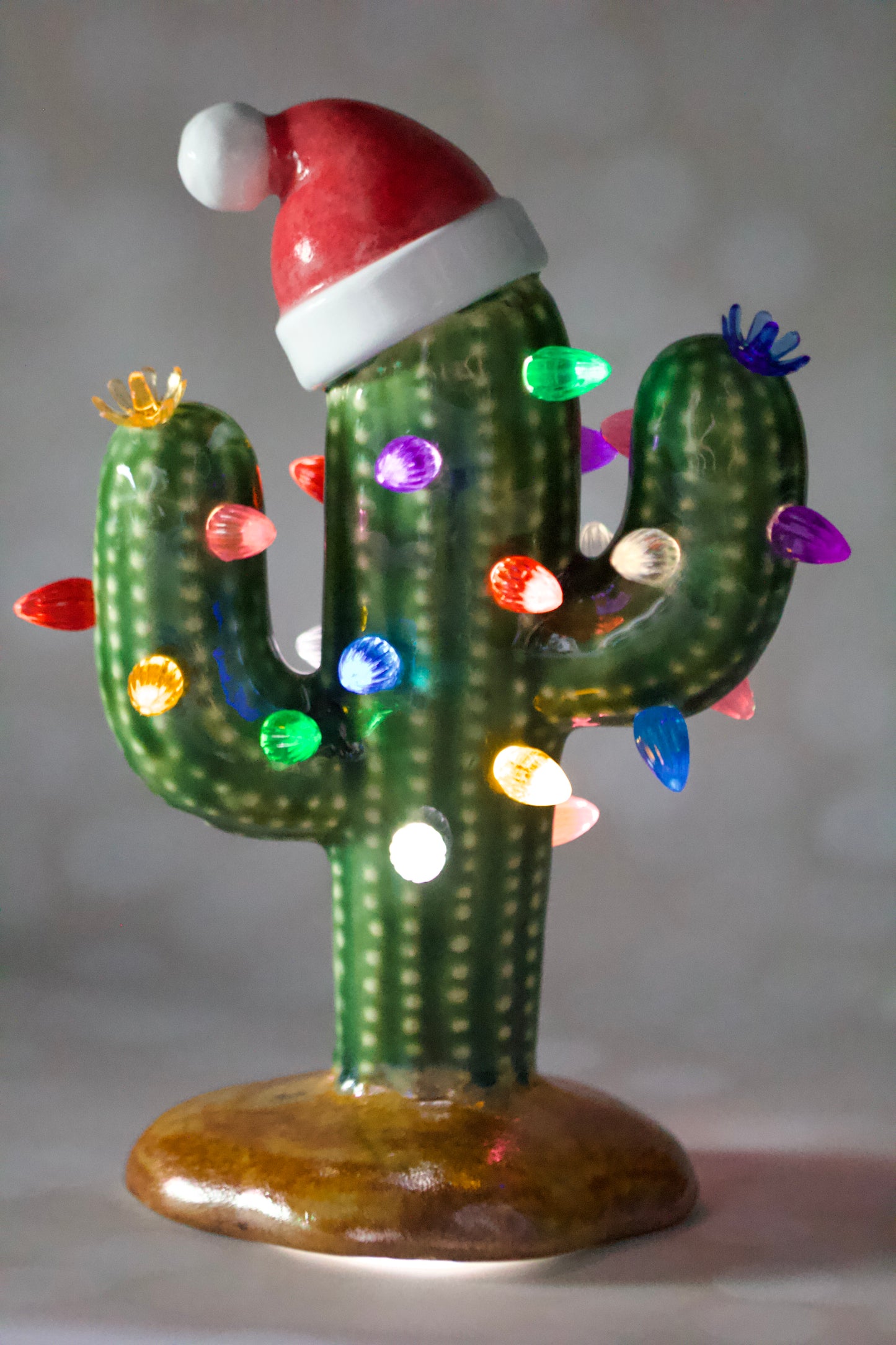 Handmade ceramic Christmas cactus tree with Santa hat, multicolored lights, and cordless LED glow, 8.5-inch vintage-inspired holiday decor