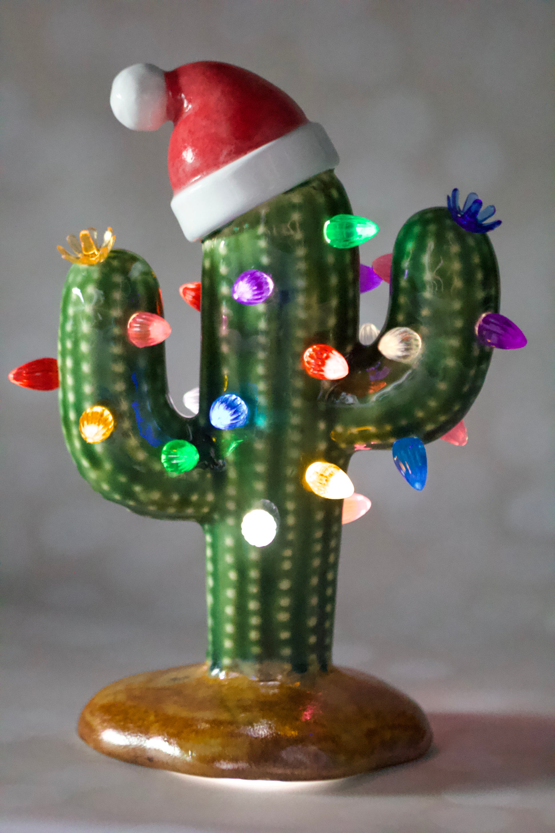Handmade ceramic Christmas cactus tree with Santa hat, multicolored lights, and cordless LED glow, 8.5-inch vintage-inspired holiday decor