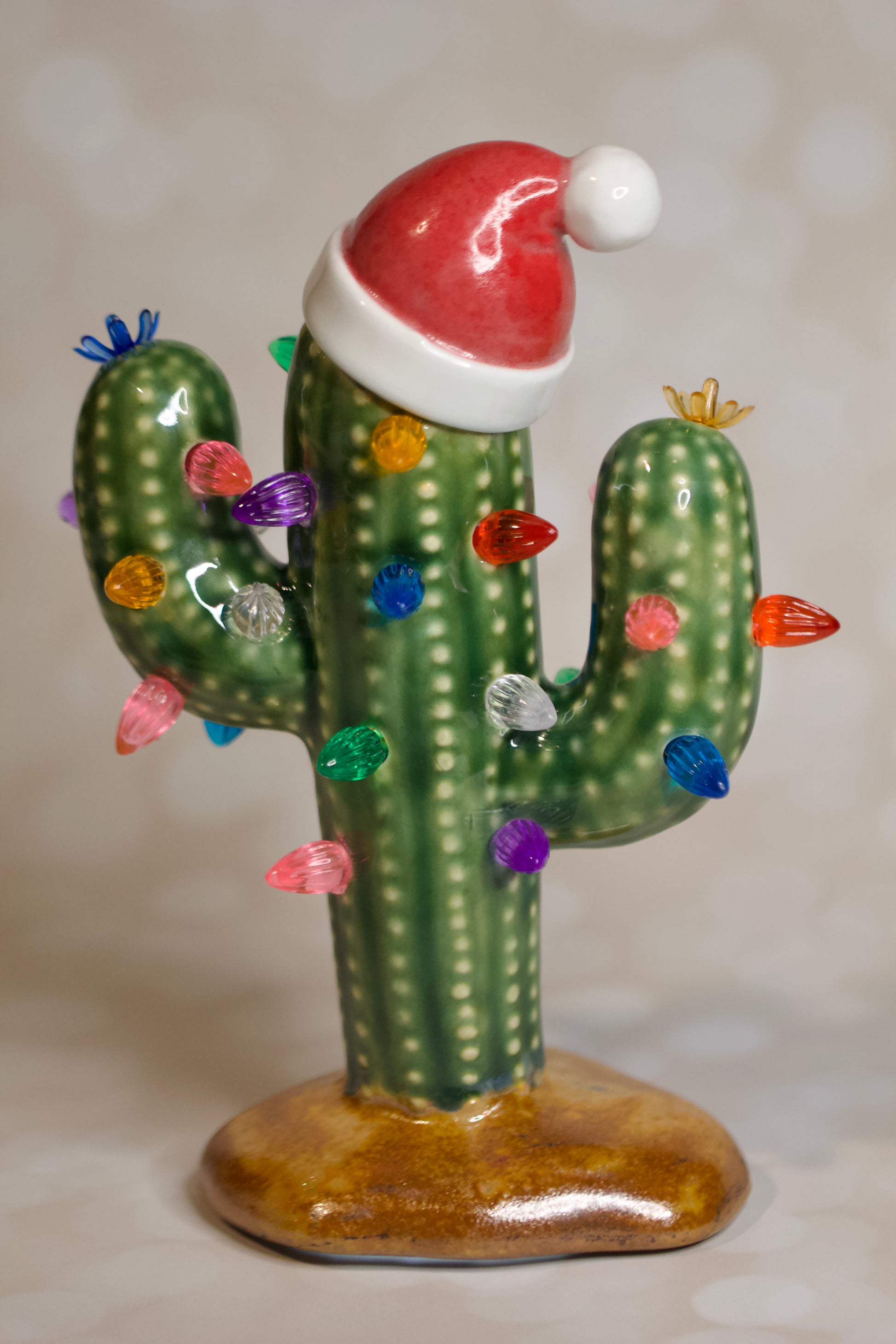 Handmade ceramic Christmas cactus tree with Santa hat, multicolored lights, and cordless LED glow, 8.5-inch vintage-inspired holiday decor