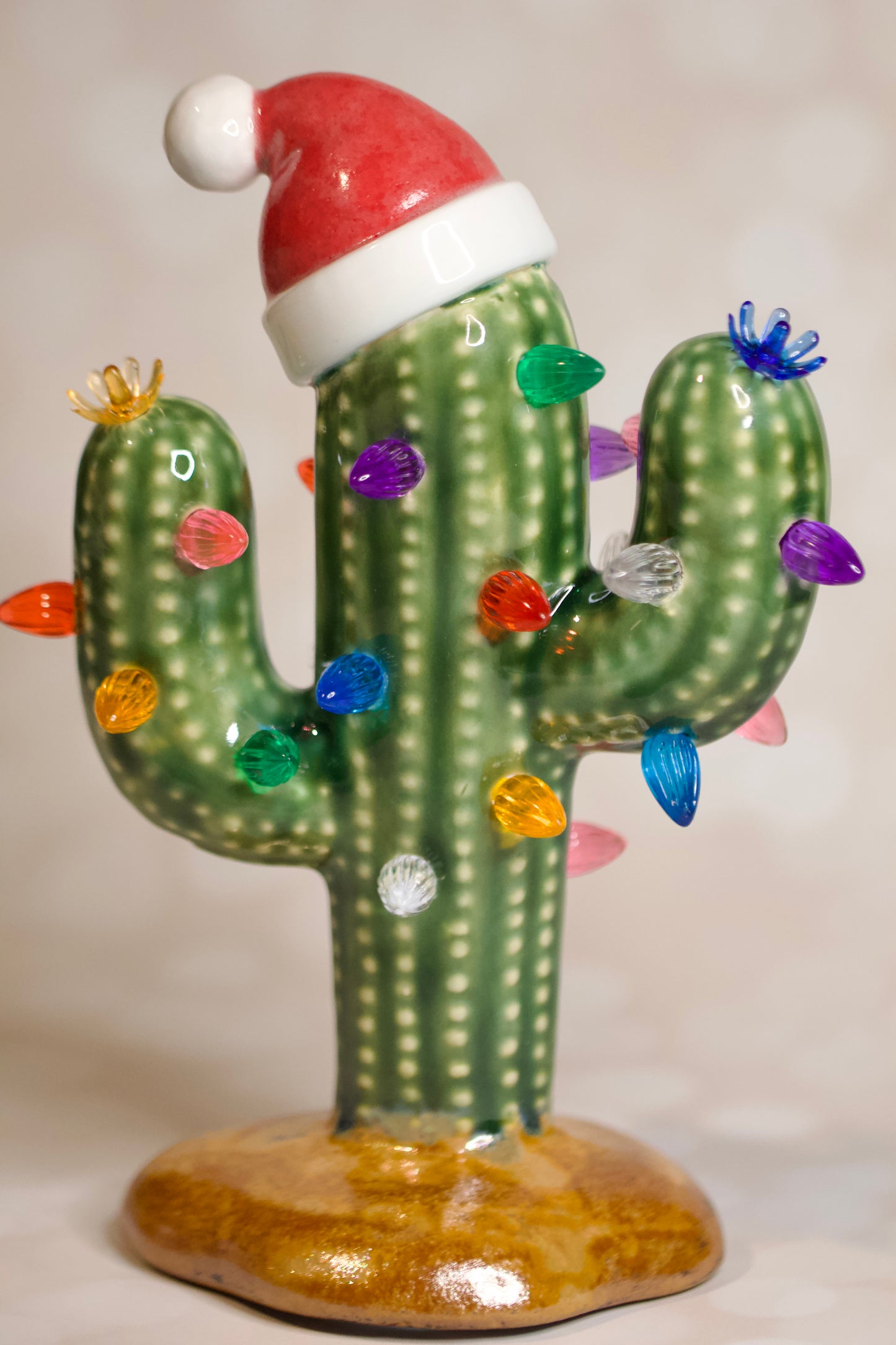 Handmade ceramic Christmas cactus tree with Santa hat, multicolored lights, and cordless LED glow, 8.5-inch vintage-inspired holiday decor
