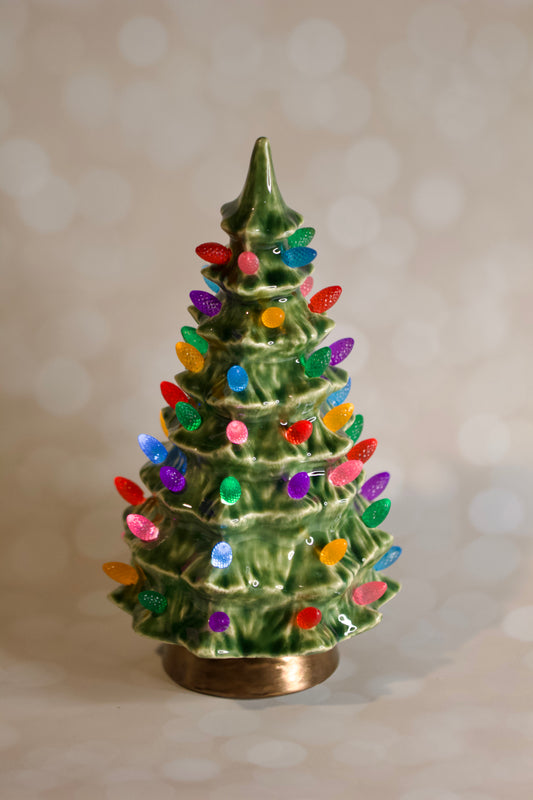 Duncan-1966-ceramic-christmas-tree-green-multicolored-lights 9 inch, fully LED lit, hand glazed, made to be an heirloom centerpeice for years of holidays to come