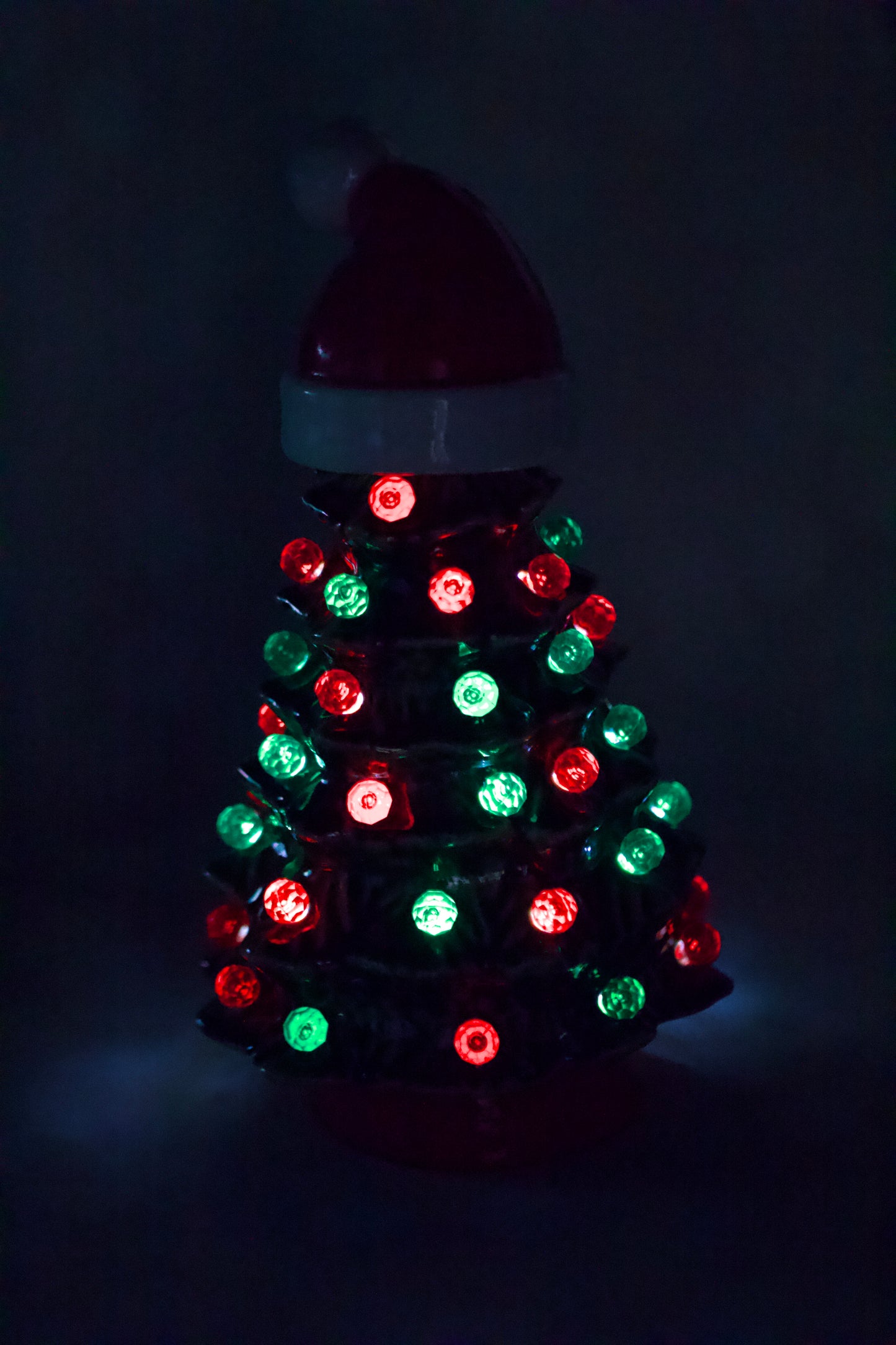 Vintage ceramic Christmas tree from a 1966 Duncan mold with Santa hat, green glaze, red and green lights, and handcrafted heirloom design