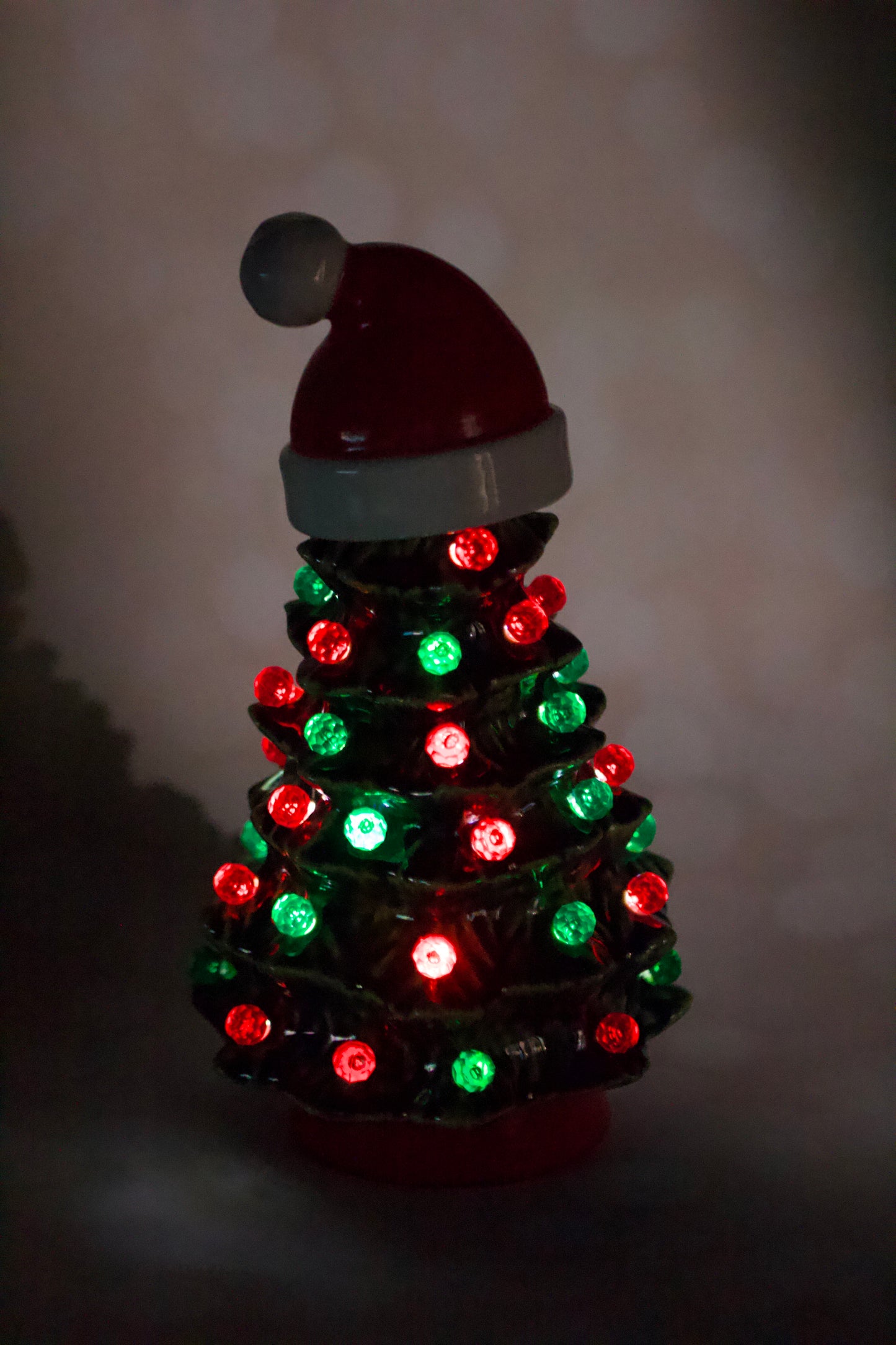 Vintage ceramic Christmas tree from a 1966 Duncan mold with Santa hat, green glaze, red and green lights, and handcrafted heirloom design