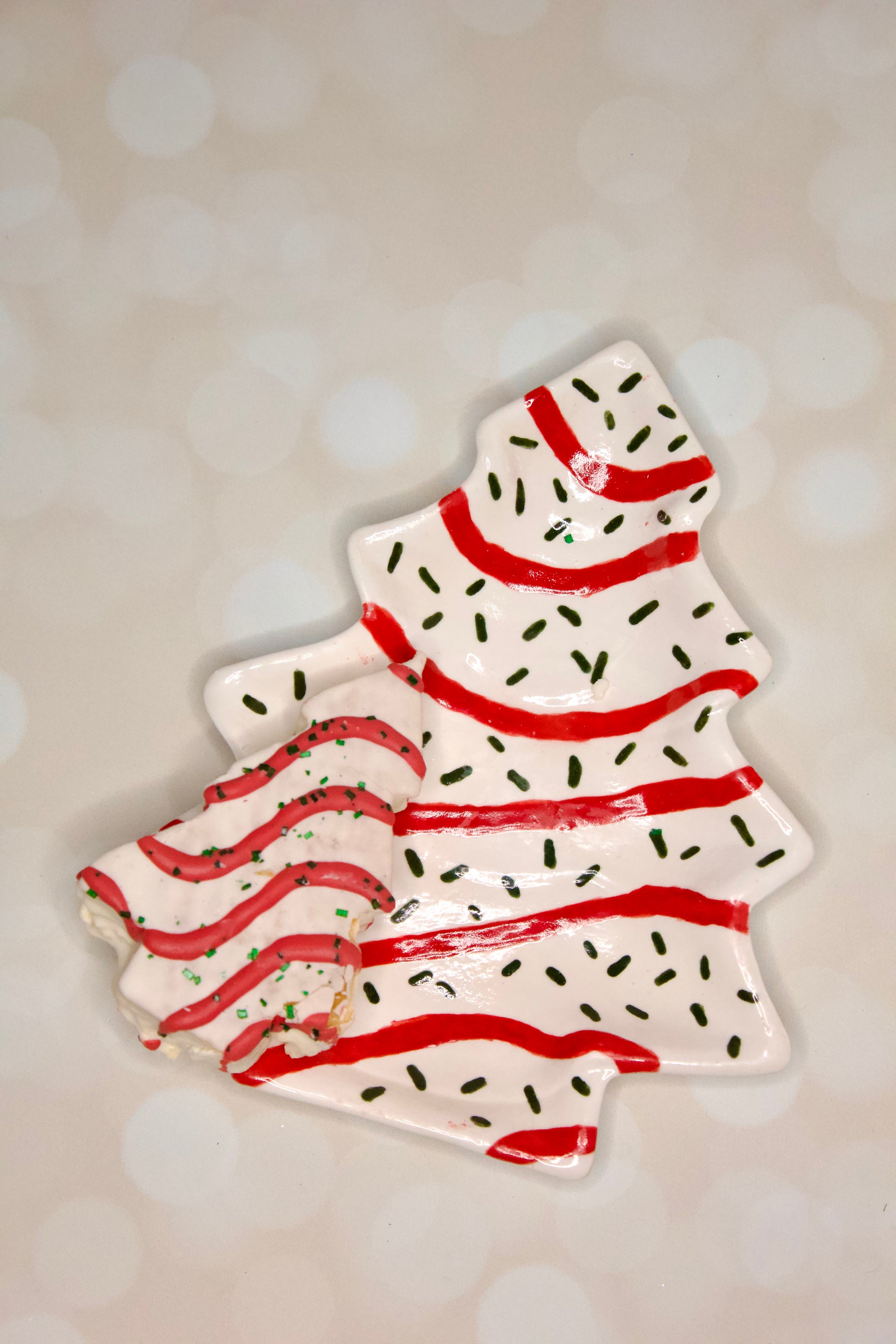 Handmade ceramic Christmas tree dessert plate inspired by Little Debbie  Christmas Tree cakes, white glaze with red and green details. Cookies for Santa.