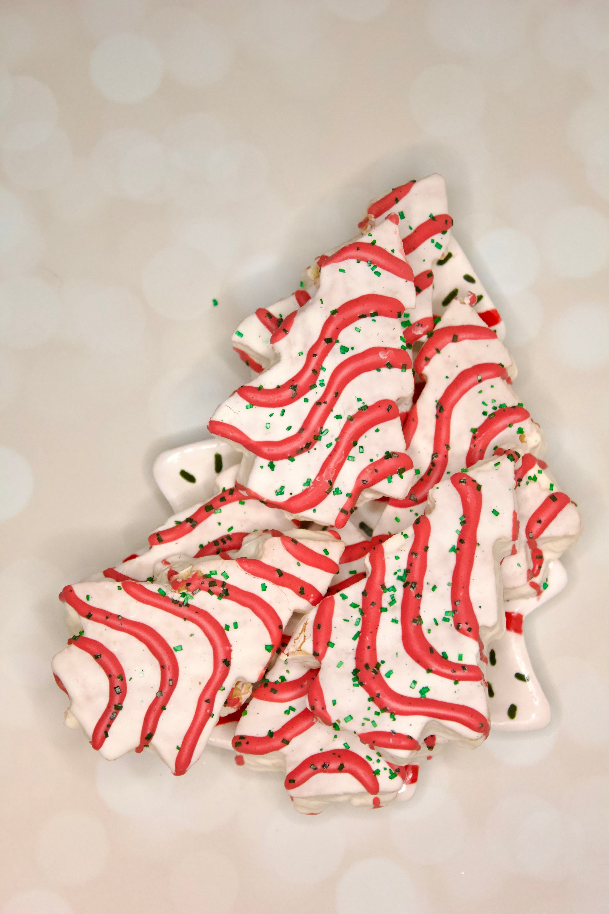 Handmade ceramic Christmas tree dessert plate inspired by Little Debbie  Christmas Tree cakes, white glaze with red and green details. Cookies for Santa.